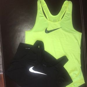 Bundle-Two Nike Pro Medium athletic shirts.